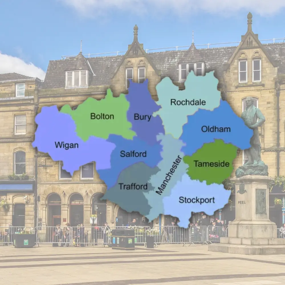 A map of Greater Manchester showing all boroughs, overlaid on a street photograph of Bury