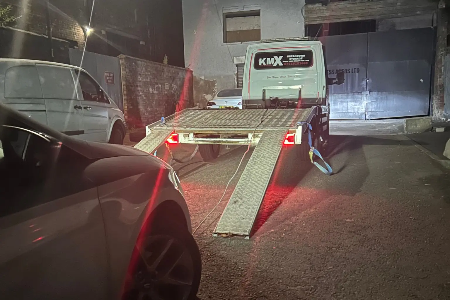 KMX-truck-in-a-narrow-residential-street